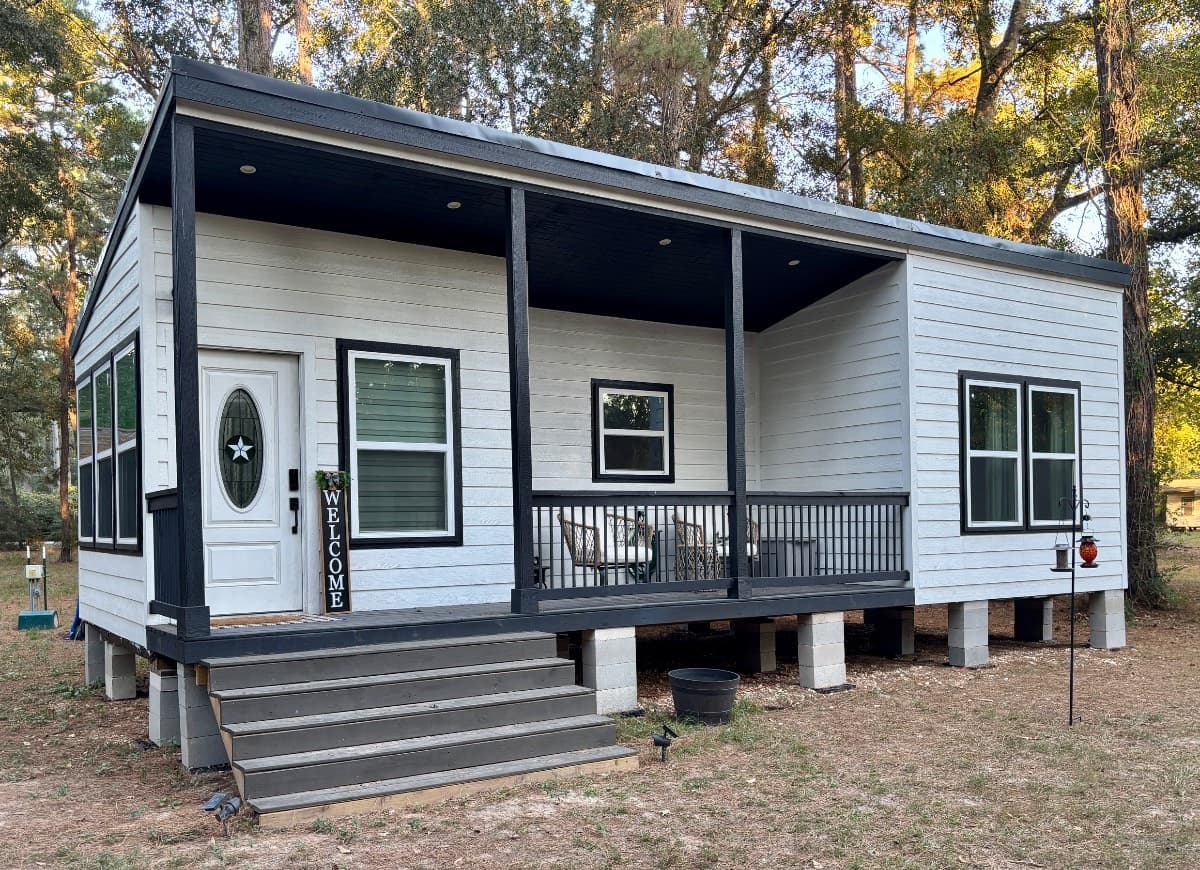 Cute and cozy 15x35 tiny home with an amazing porch!